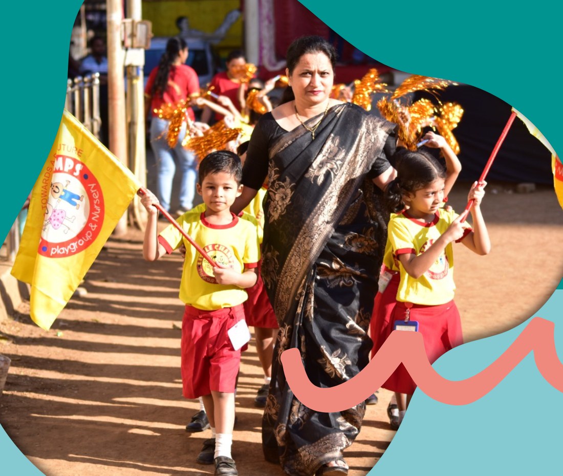 Sujata Narkar walking with Little Champs students